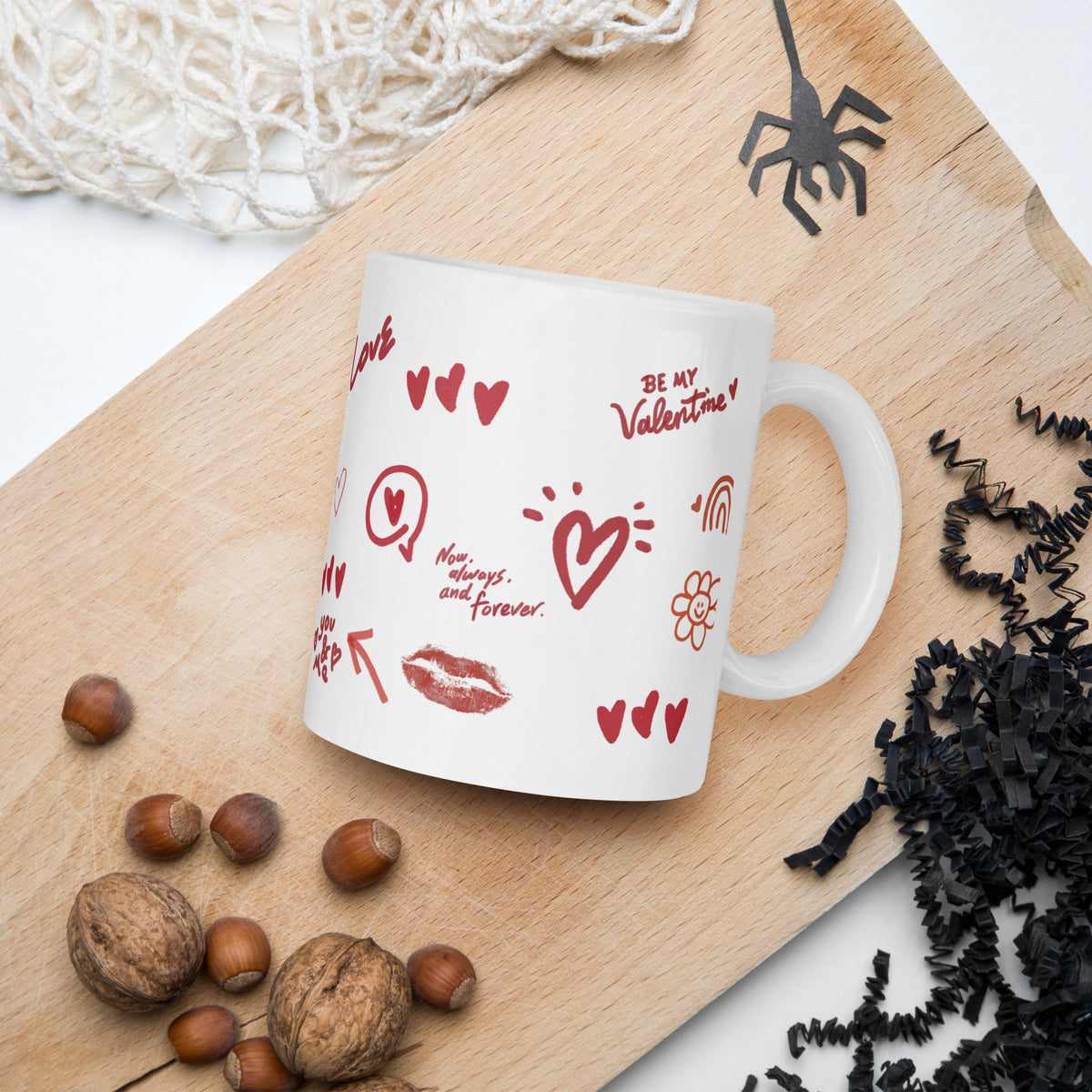 This sweet white ceramic mug is decorated with cute hand-drawn red Valentine-themed doodles, including hearts, lip prints and little flowers. It is printed with the phrase "Be my Valentine", perfect as a lovely gift for your sweetheart on Valentine’s Day. Sip your hot drinks and share your love with this charming cup!