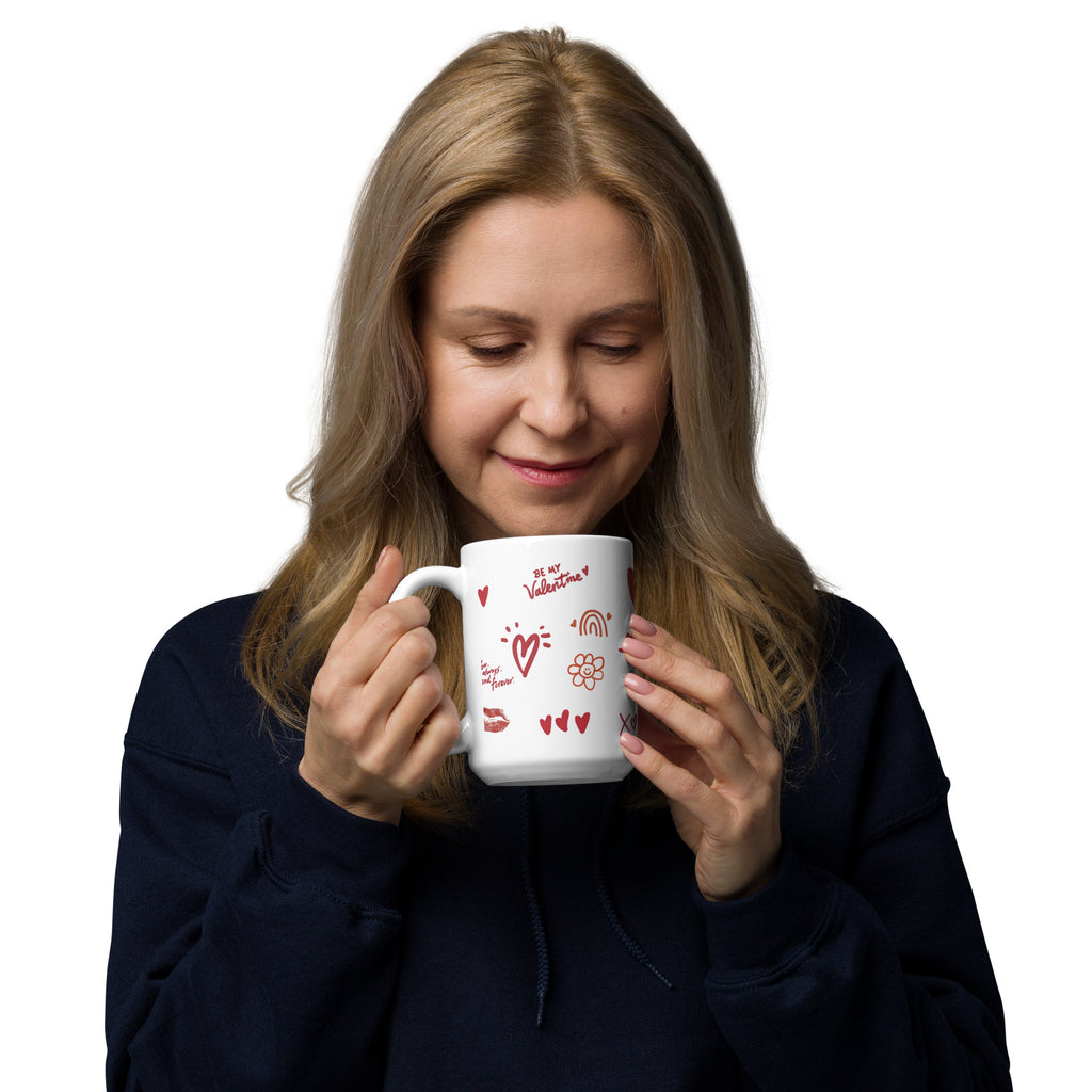 This sweet white ceramic mug is decorated with cute hand-drawn red Valentine-themed doodles, including hearts, lip prints and little flowers. It is printed with the phrase "Be my Valentine", perfect as a lovely gift for your sweetheart on Valentine’s Day. Sip your hot drinks and share your love with this charming cup!