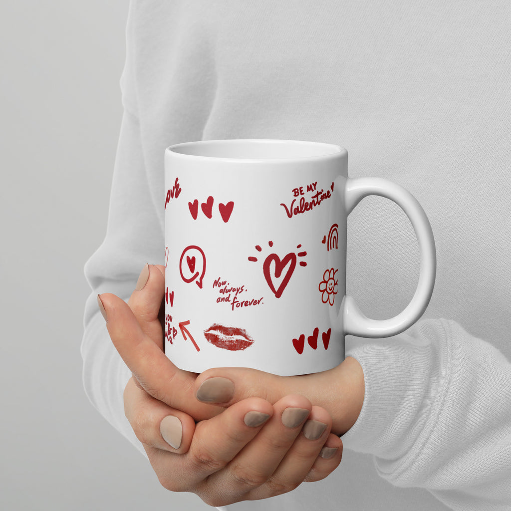 This sweet white ceramic mug is decorated with cute hand-drawn red Valentine-themed doodles, including hearts, lip prints and little flowers. It is printed with the phrase "Be my Valentine", perfect as a lovely gift for your sweetheart on Valentine’s Day. Sip your hot drinks and share your love with this charming cup!
