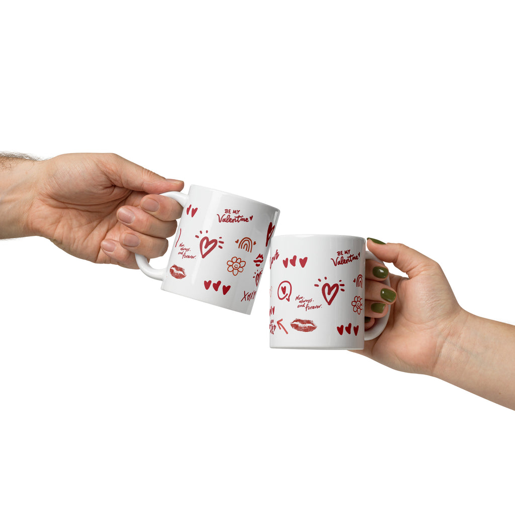 This sweet white ceramic mug is decorated with cute hand-drawn red Valentine-themed doodles, including hearts, lip prints and little flowers. It is printed with the phrase "Be my Valentine", perfect as a lovely gift for your sweetheart on Valentine’s Day. Sip your hot drinks and share your love with this charming cup!