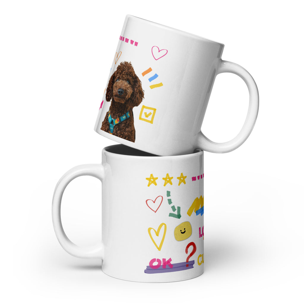 This custom white ceramic mug features an adorable brown poodle portrait surrounded by playful hand-drawn doodles, including hearts, checkmarks and colourful marker strokes.
Vibrant, whimsical decorations wrap around both sides of the cup, making it a sweet personalized gift for dog lovers.
Perfect for enjoying your morning coffee while showing off your love for your furry friend.