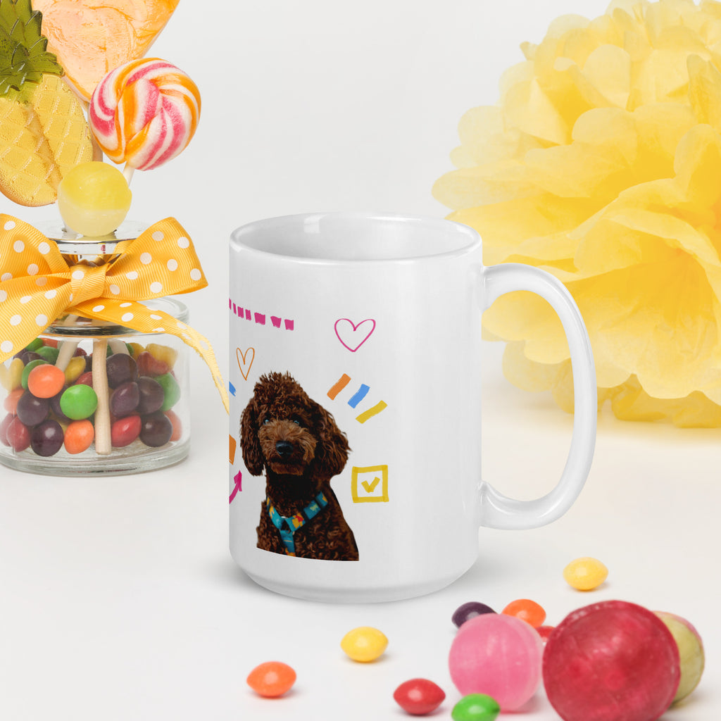 This custom white ceramic mug features an adorable brown poodle portrait surrounded by playful hand-drawn doodles, including hearts, checkmarks and colourful marker strokes.
Vibrant, whimsical decorations wrap around both sides of the cup, making it a sweet personalized gift for dog lovers.
Perfect for enjoying your morning coffee while showing off your love for your furry friend.