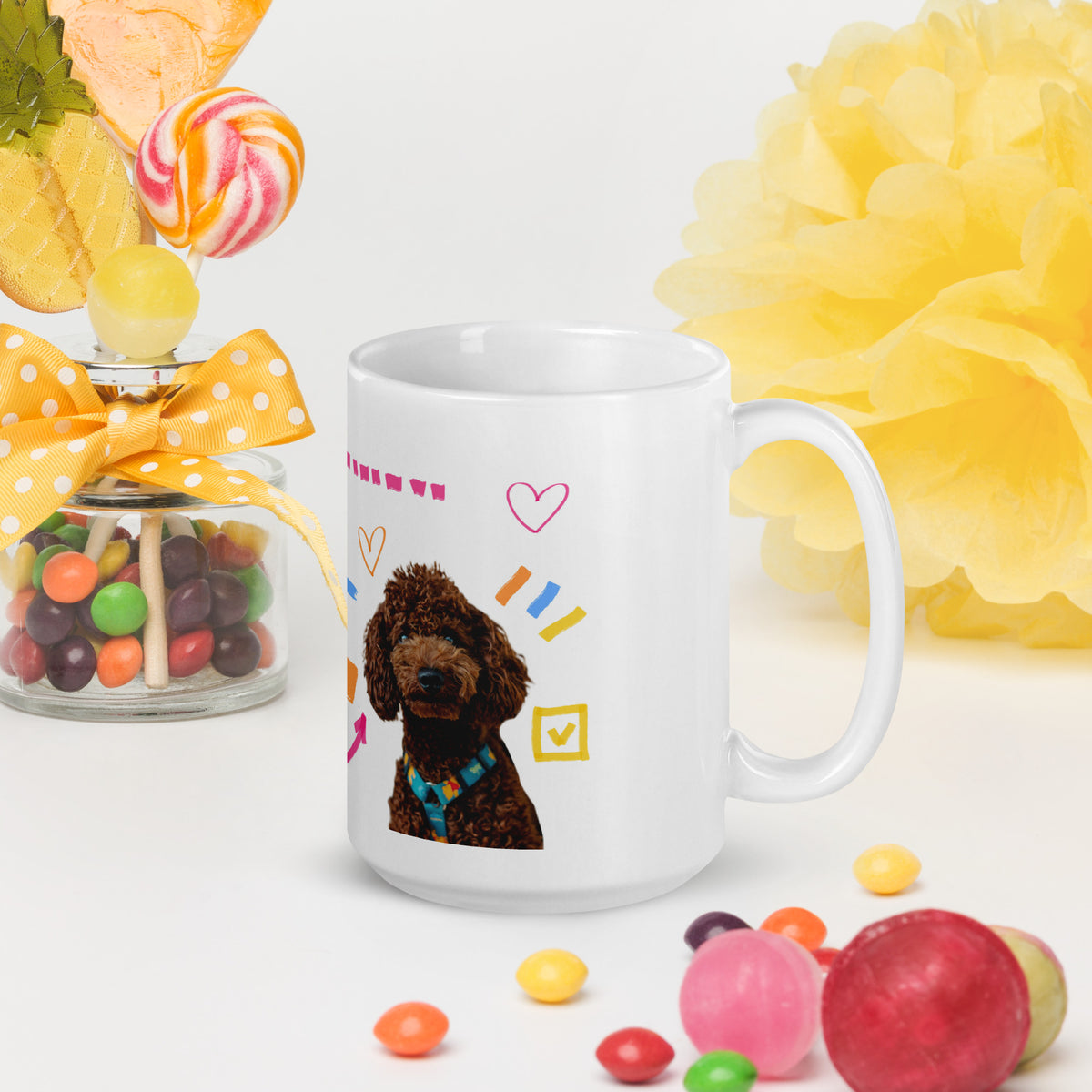 This custom white ceramic mug features an adorable brown poodle portrait surrounded by playful hand-drawn doodles, including hearts, checkmarks and colourful marker strokes.
Vibrant, whimsical decorations wrap around both sides of the cup, making it a sweet personalized gift for dog lovers.
Perfect for enjoying your morning coffee while showing off your love for your furry friend.