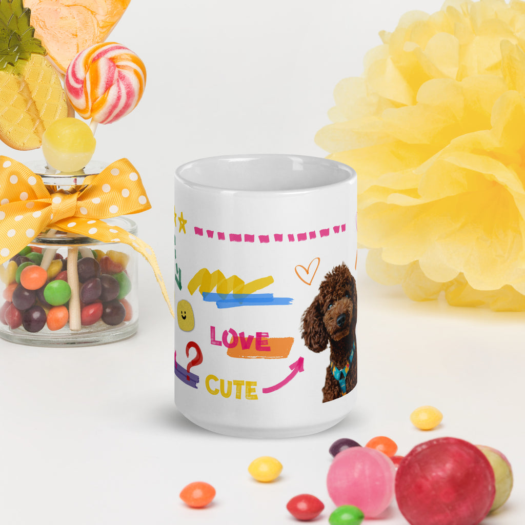 This custom white ceramic mug features an adorable brown poodle portrait surrounded by playful hand-drawn doodles, including hearts, checkmarks and colourful marker strokes.
Vibrant, whimsical decorations wrap around both sides of the cup, making it a sweet personalized gift for dog lovers.
Perfect for enjoying your morning coffee while showing off your love for your furry friend.