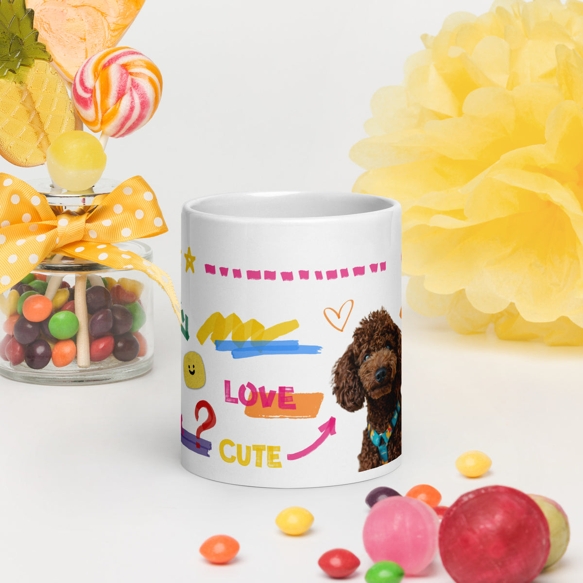This custom white ceramic mug features an adorable brown poodle portrait surrounded by playful hand-drawn doodles, including hearts, checkmarks and colourful marker strokes.
Vibrant, whimsical decorations wrap around both sides of the cup, making it a sweet personalized gift for dog lovers.
Perfect for enjoying your morning coffee while showing off your love for your furry friend.