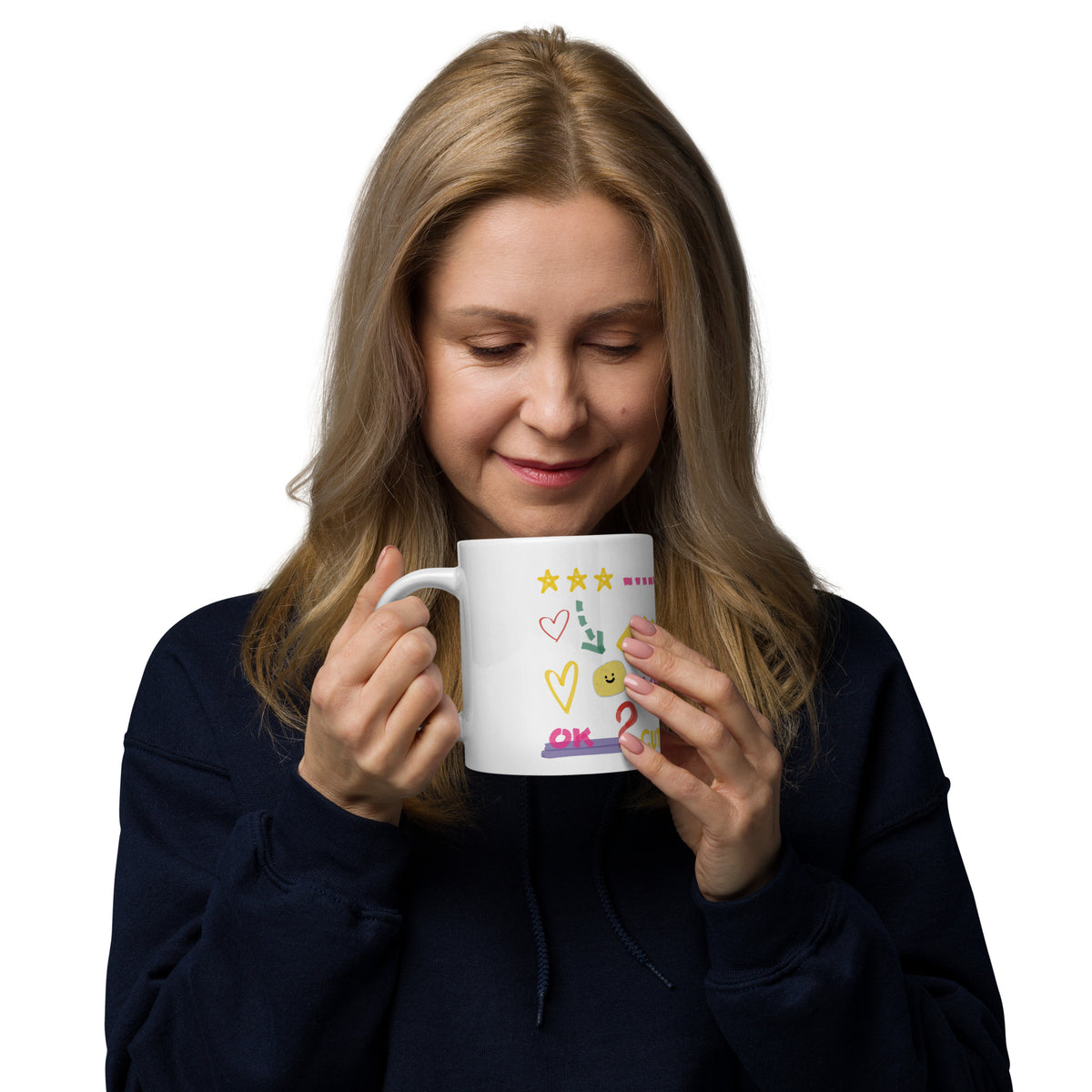 This custom white ceramic mug features an adorable brown poodle portrait surrounded by playful hand-drawn doodles, including hearts, checkmarks and colourful marker strokes.
Vibrant, whimsical decorations wrap around both sides of the cup, making it a sweet personalized gift for dog lovers.
Perfect for enjoying your morning coffee while showing off your love for your furry friend.
