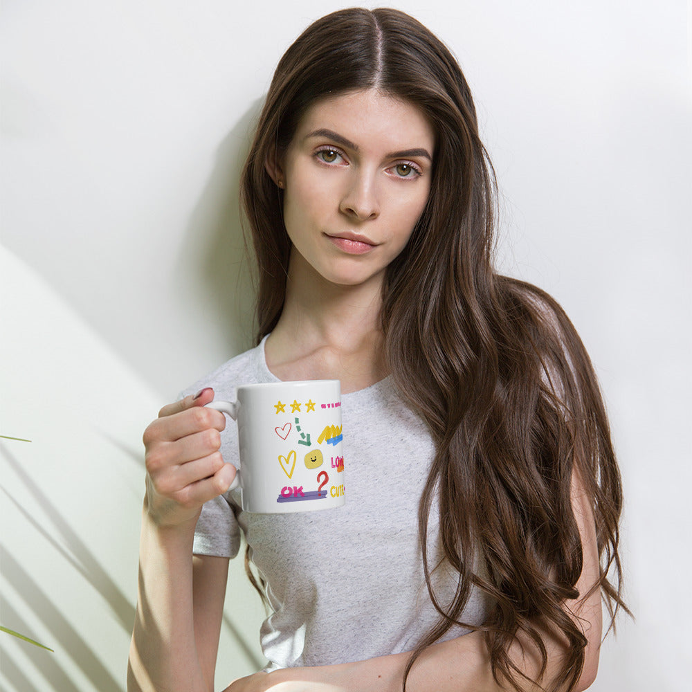 This custom white ceramic mug features an adorable brown poodle portrait surrounded by playful hand-drawn doodles, including hearts, checkmarks and colourful marker strokes.
Vibrant, whimsical decorations wrap around both sides of the cup, making it a sweet personalized gift for dog lovers.
Perfect for enjoying your morning coffee while showing off your love for your furry friend.