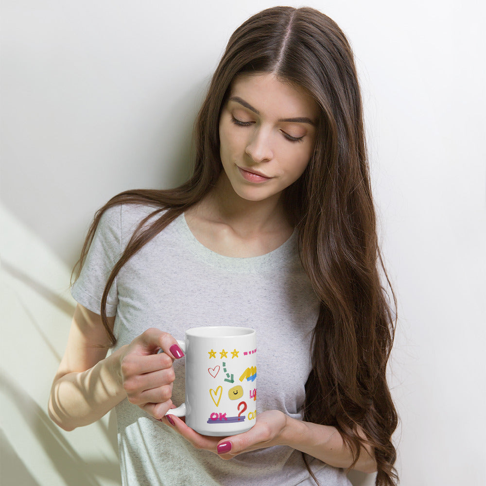 This custom white ceramic mug features an adorable brown poodle portrait surrounded by playful hand-drawn doodles, including hearts, checkmarks and colourful marker strokes.
Vibrant, whimsical decorations wrap around both sides of the cup, making it a sweet personalized gift for dog lovers.
Perfect for enjoying your morning coffee while showing off your love for your furry friend.