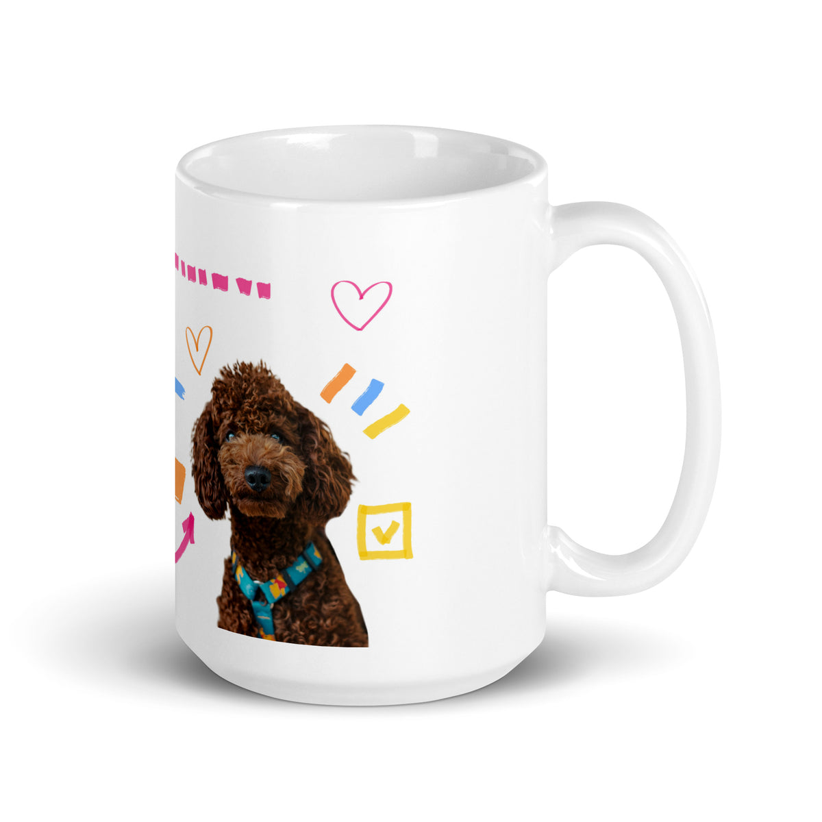 This custom white ceramic mug features an adorable brown poodle portrait surrounded by playful hand-drawn doodles, including hearts, checkmarks and colourful marker strokes.
Vibrant, whimsical decorations wrap around both sides of the cup, making it a sweet personalized gift for dog lovers.
Perfect for enjoying your morning coffee while showing off your love for your furry friend.