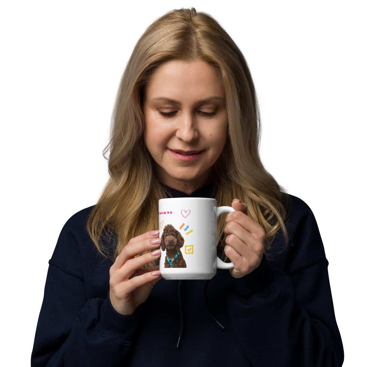 This custom white ceramic mug features an adorable brown poodle portrait surrounded by playful hand-drawn doodles, including hearts, checkmarks and colourful marker strokes.
Vibrant, whimsical decorations wrap around both sides of the cup, making it a sweet personalized gift for dog lovers.
Perfect for enjoying your morning coffee while showing off your love for your furry friend.