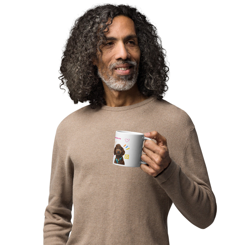 This custom white ceramic mug features an adorable brown poodle portrait surrounded by playful hand-drawn doodles, including hearts, checkmarks and colourful marker strokes.
Vibrant, whimsical decorations wrap around both sides of the cup, making it a sweet personalized gift for dog lovers.
Perfect for enjoying your morning coffee while showing off your love for your furry friend.